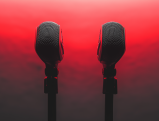 Two professional microphones silhouetted against dramatic red background representing music industry legal battle